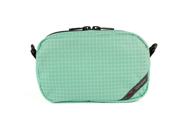 An all-fabric Seafoam green with white grid pattern 3D Organizer Cube.
